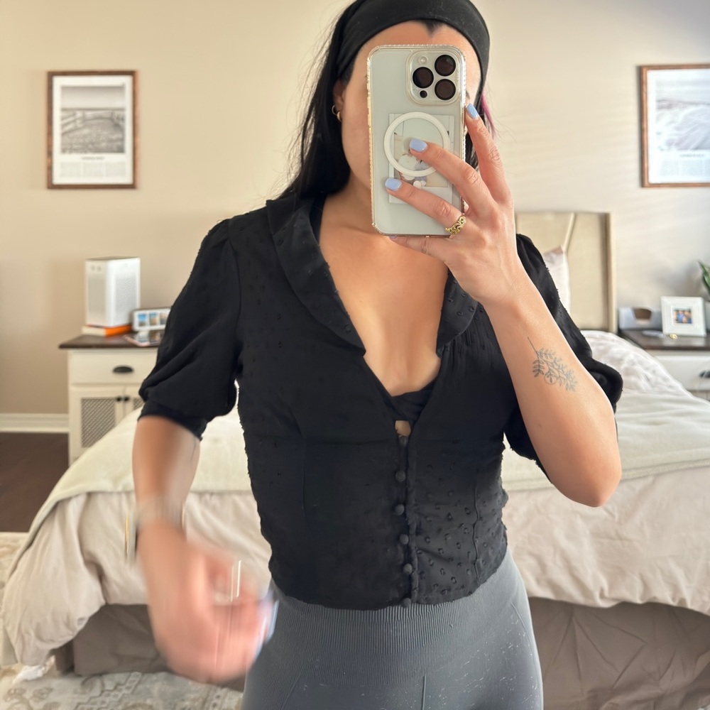 Free People, black sheer blouse, size small.